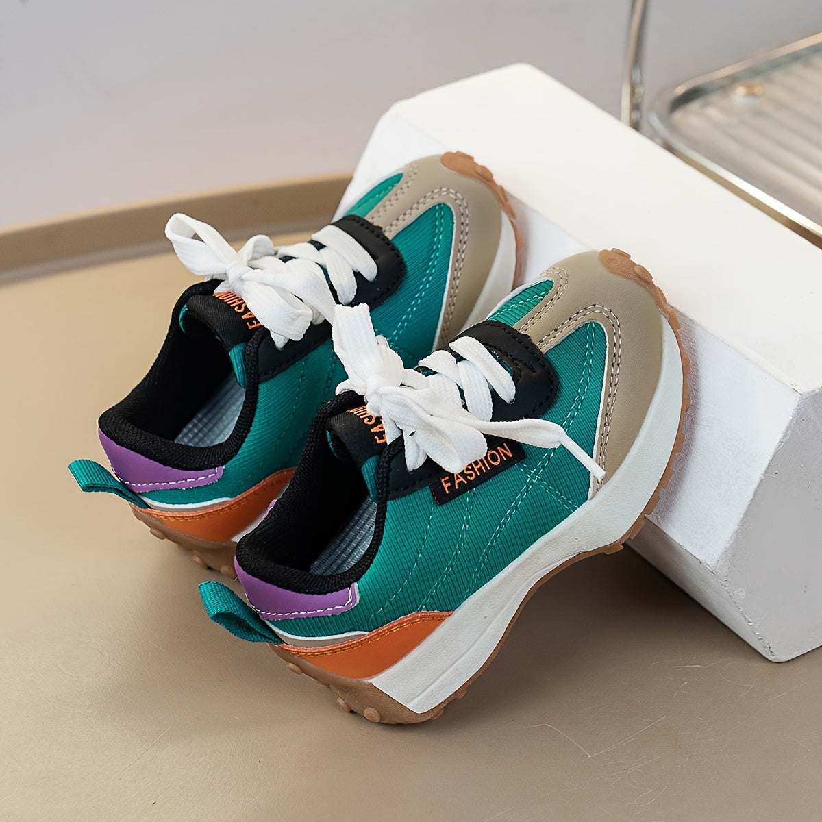 Fashionable Infant Sneakers: Retro, Preppy, and Sporty Design