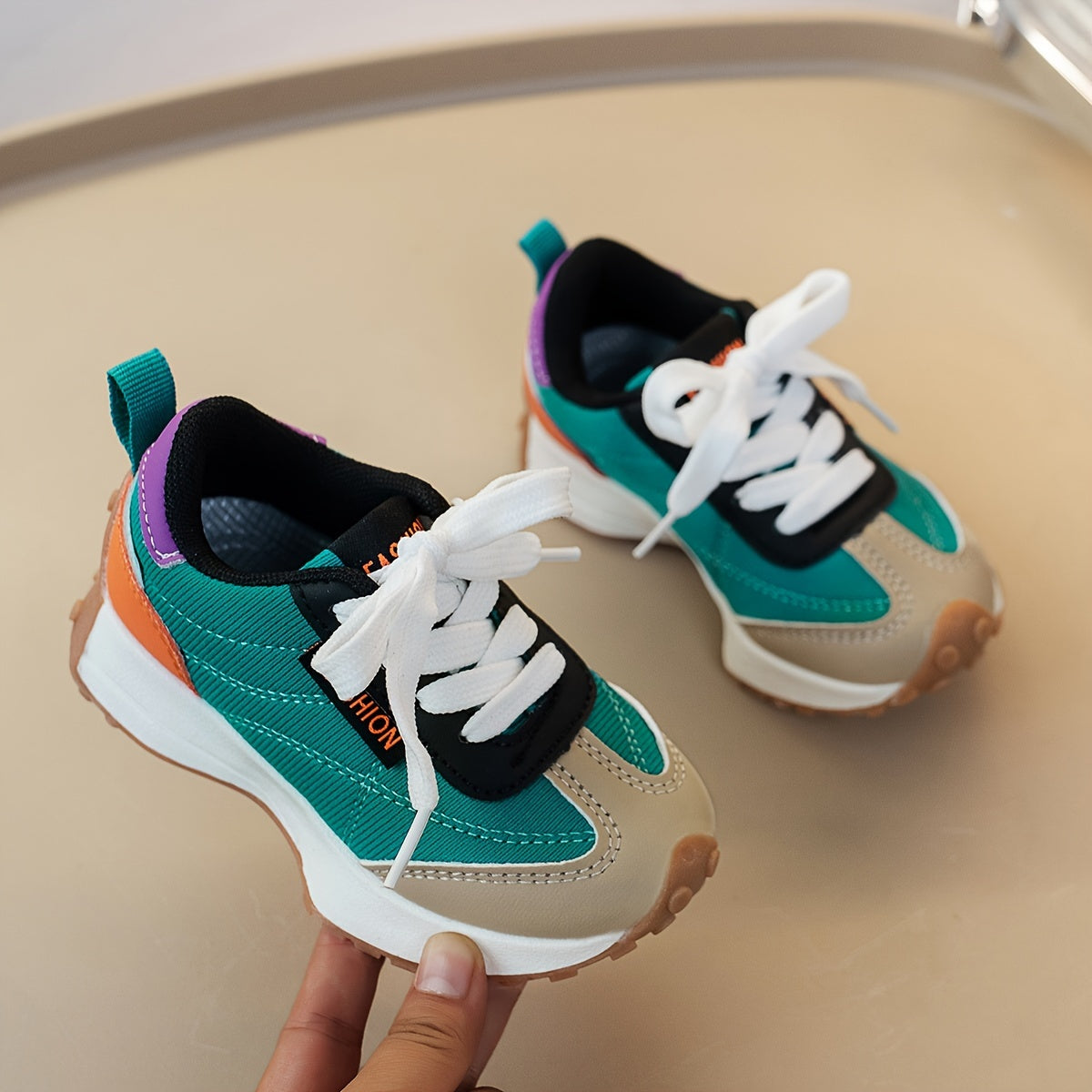 Fashionable Infant Sneakers: Retro, Preppy, and Sporty Design